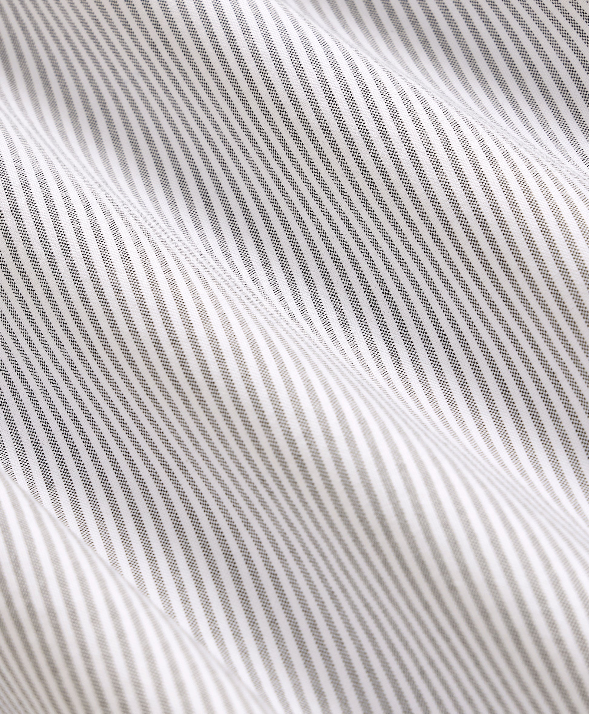 Close-up of a textured fabric with wavy lines
