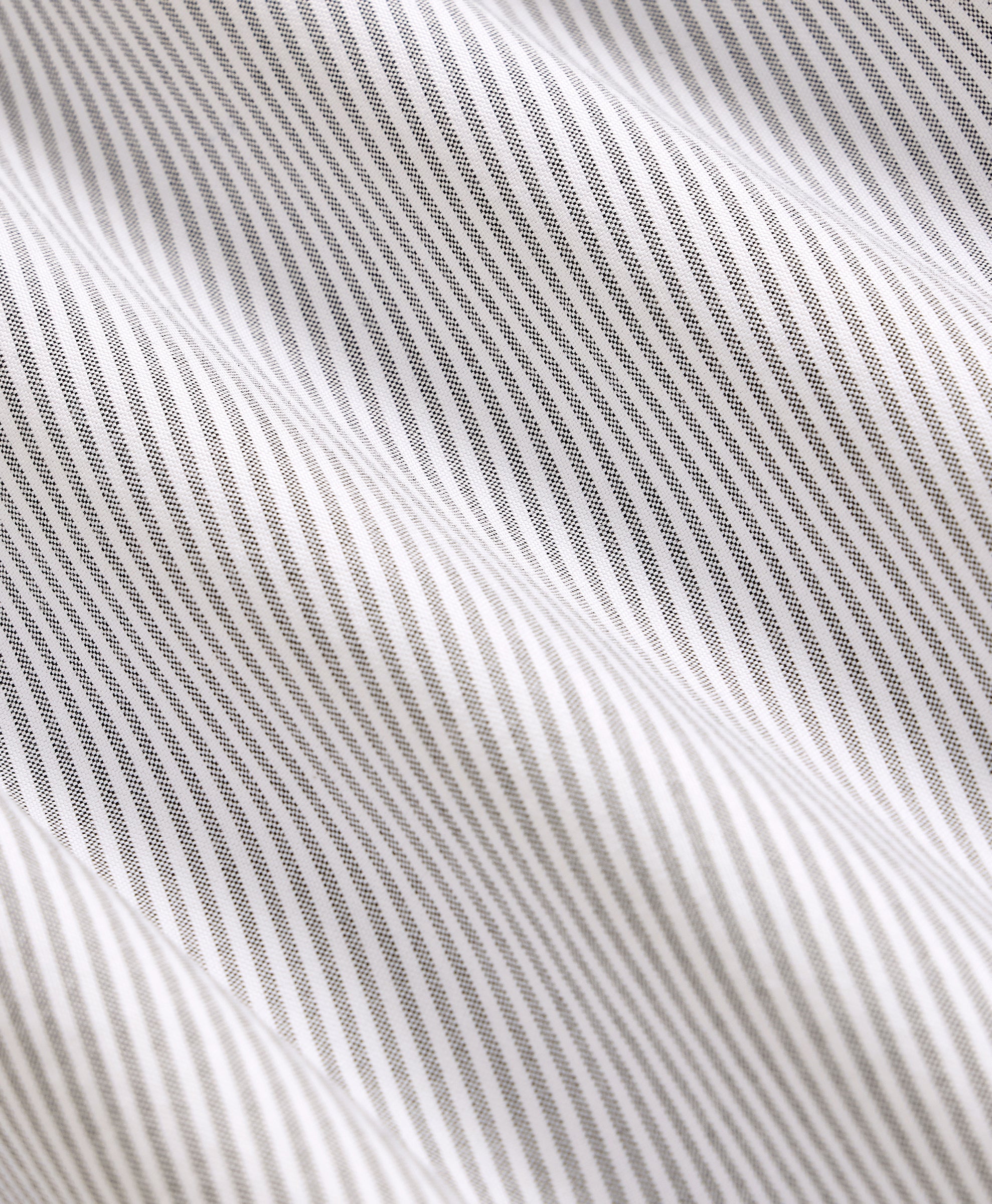 Close-up of a textured fabric with wavy lines