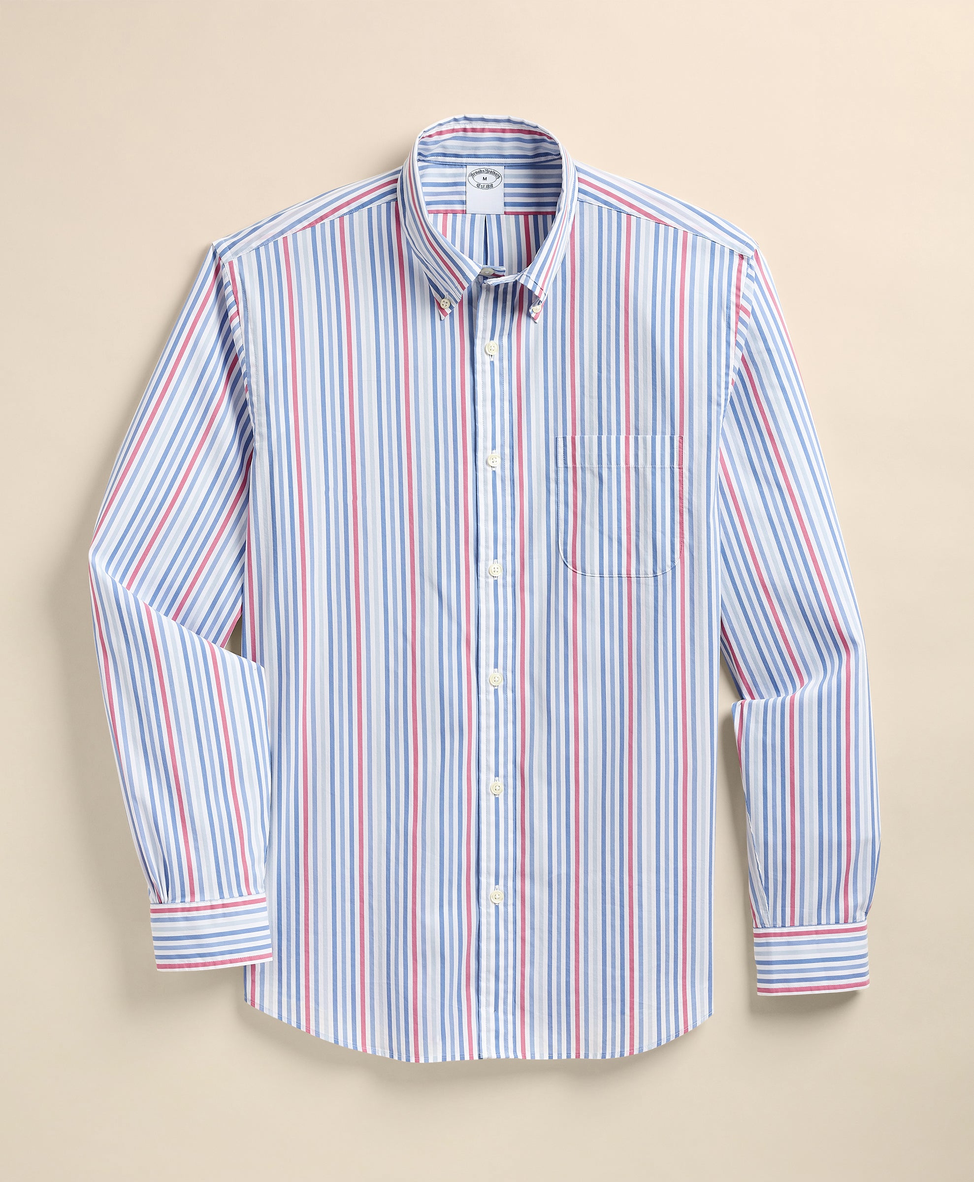 Striped shirt on a beige background