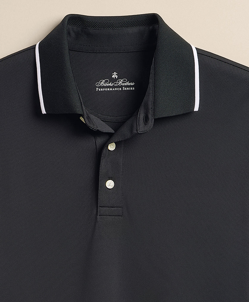 Black polo shirt with white trim and brand logo