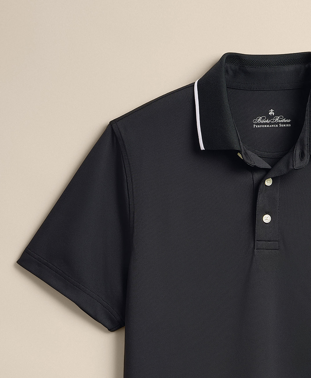 Black polo shirt with white trim