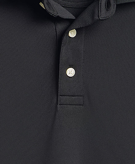 Close-up of a black polo shirt with buttons