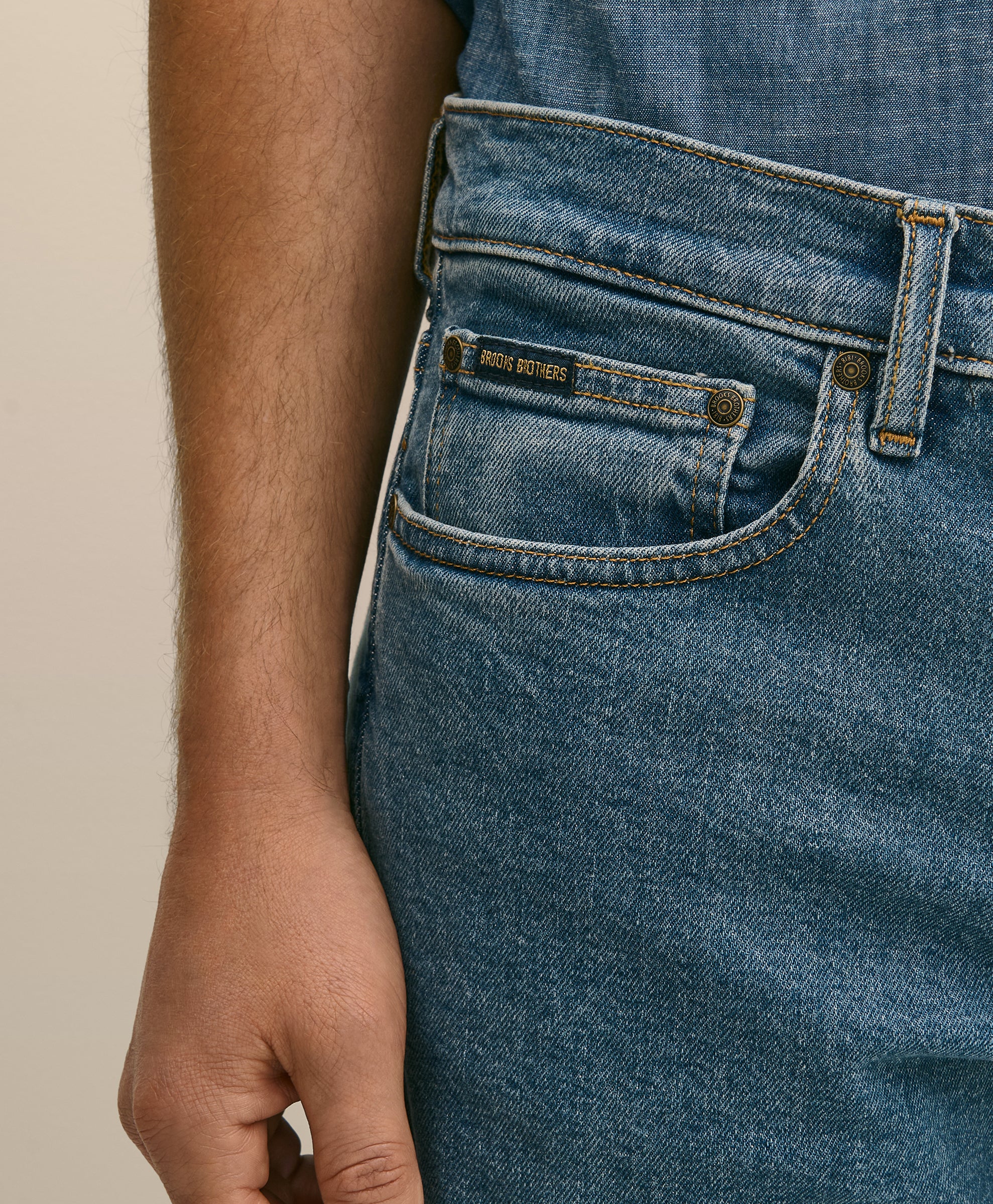 Close-up of blue jeans with a brand label