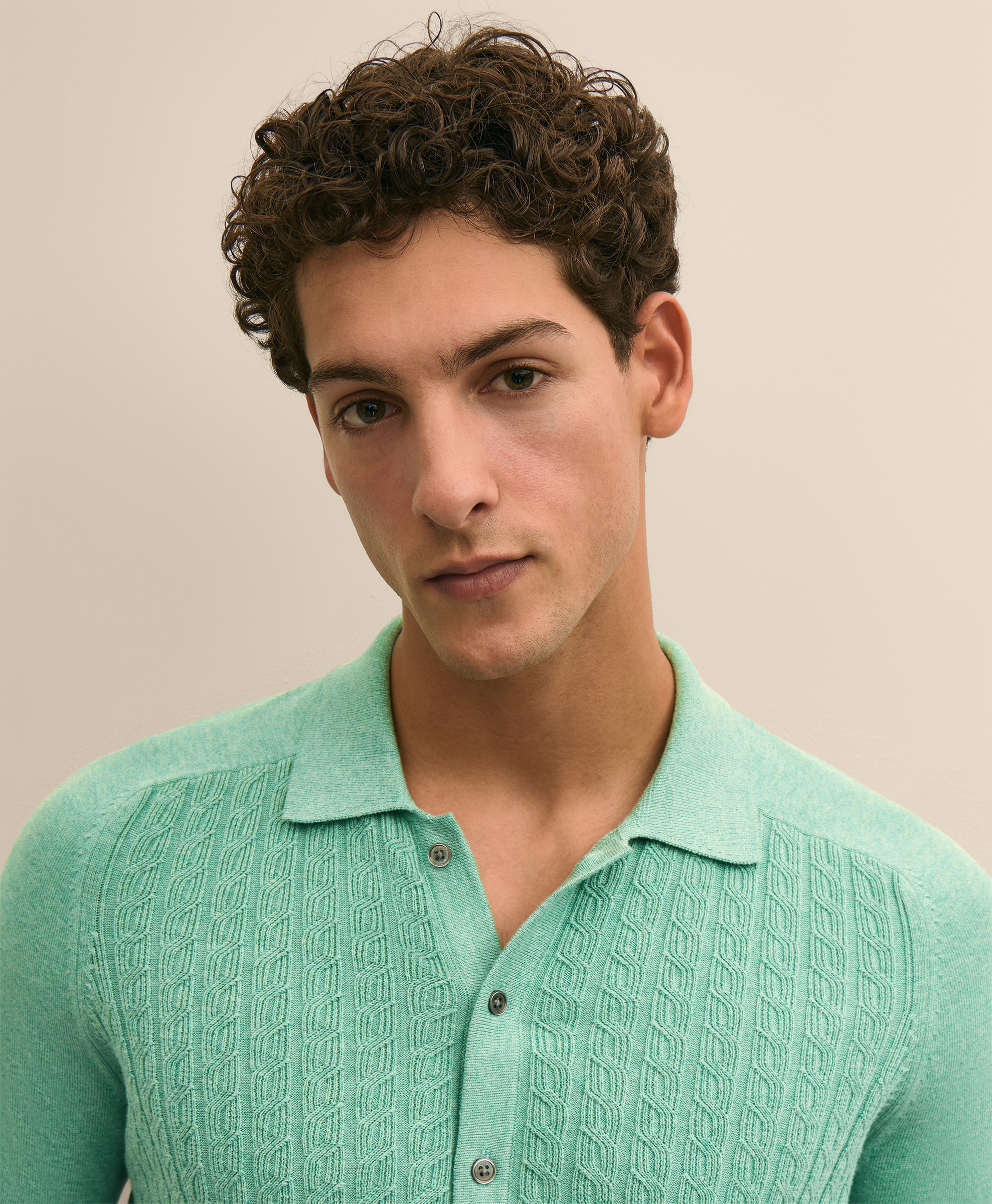 Man wearing a light green textured shirt