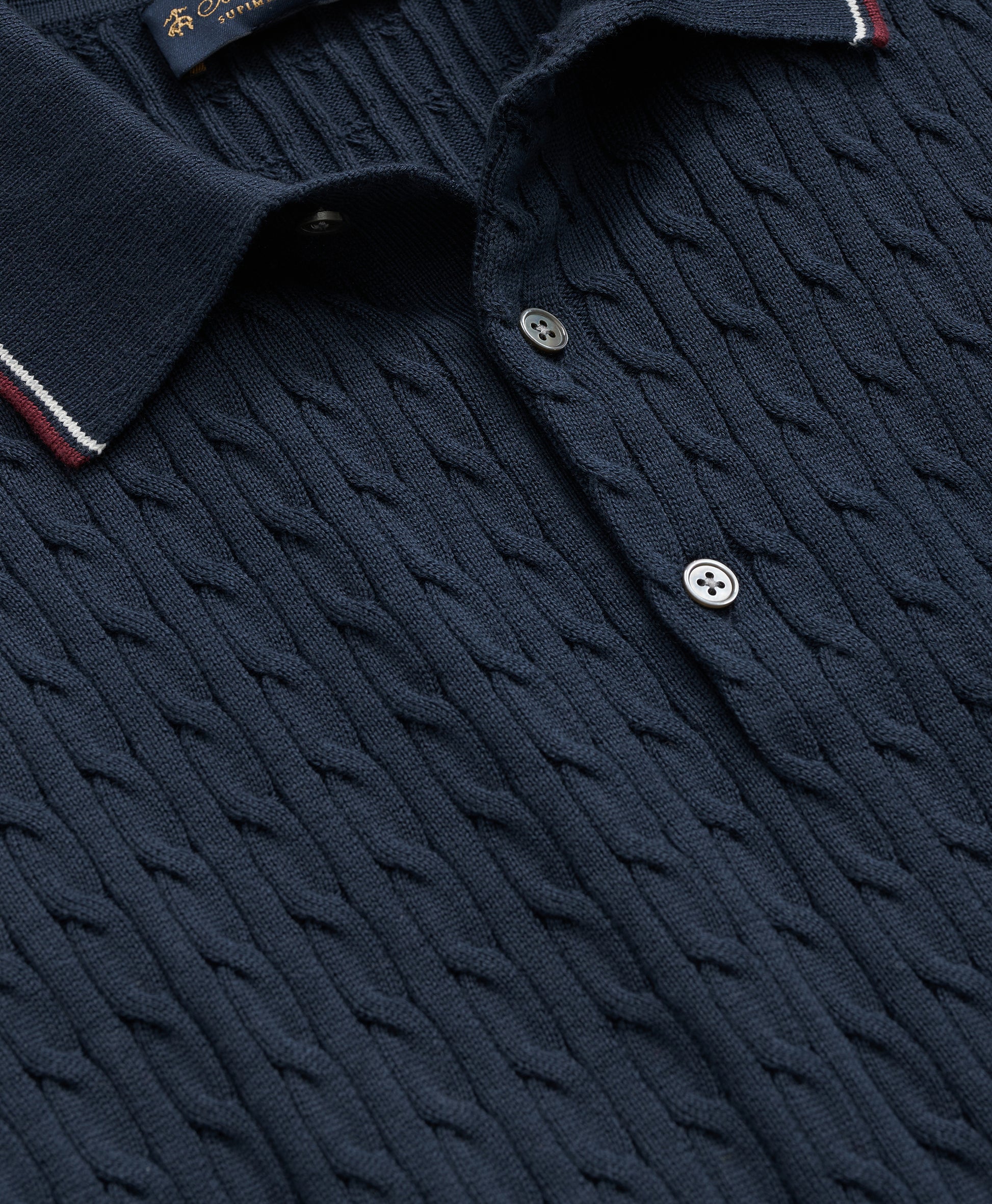 Navy blue textured polo shirt with buttons
