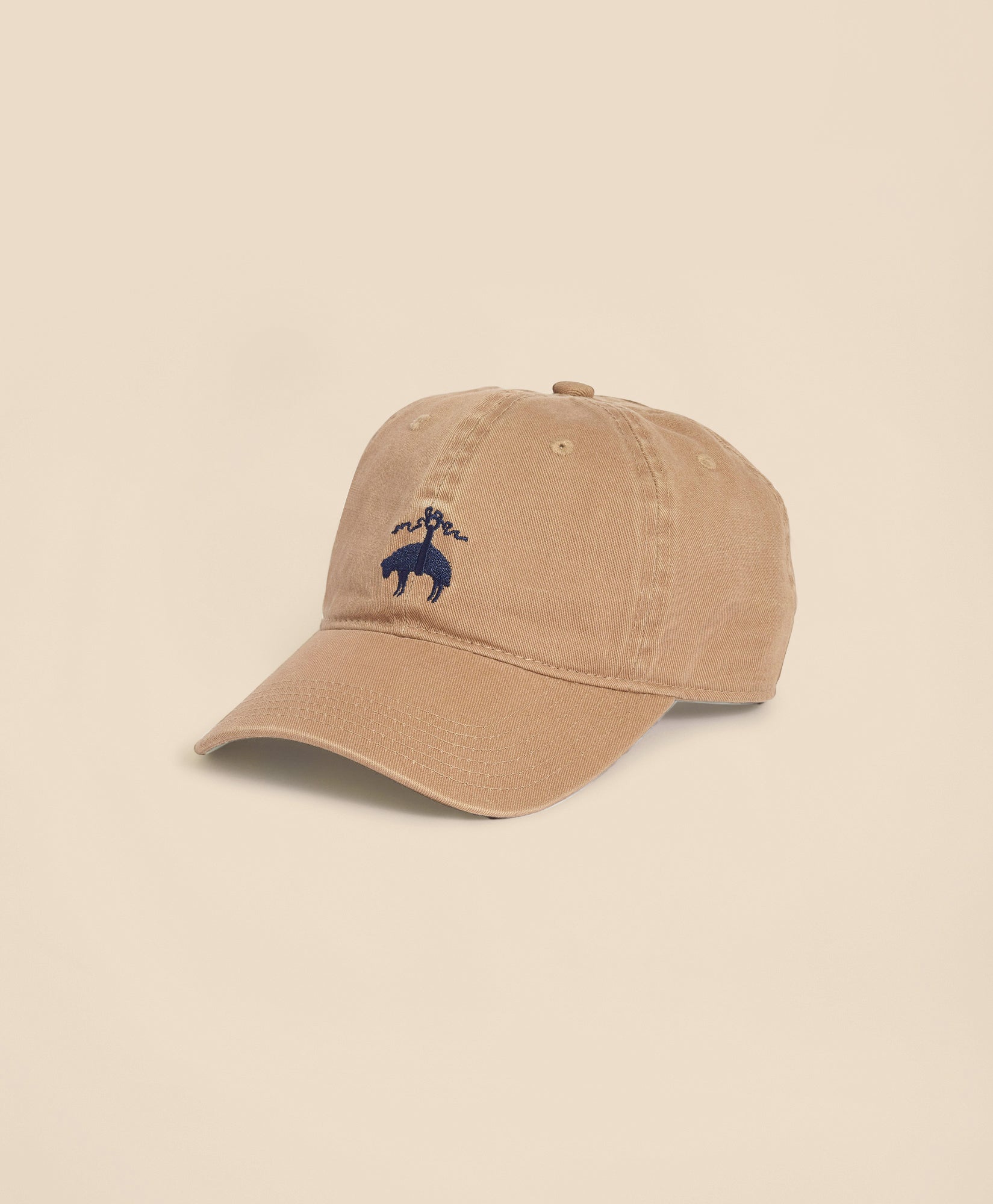 Beige cap with a blue logo