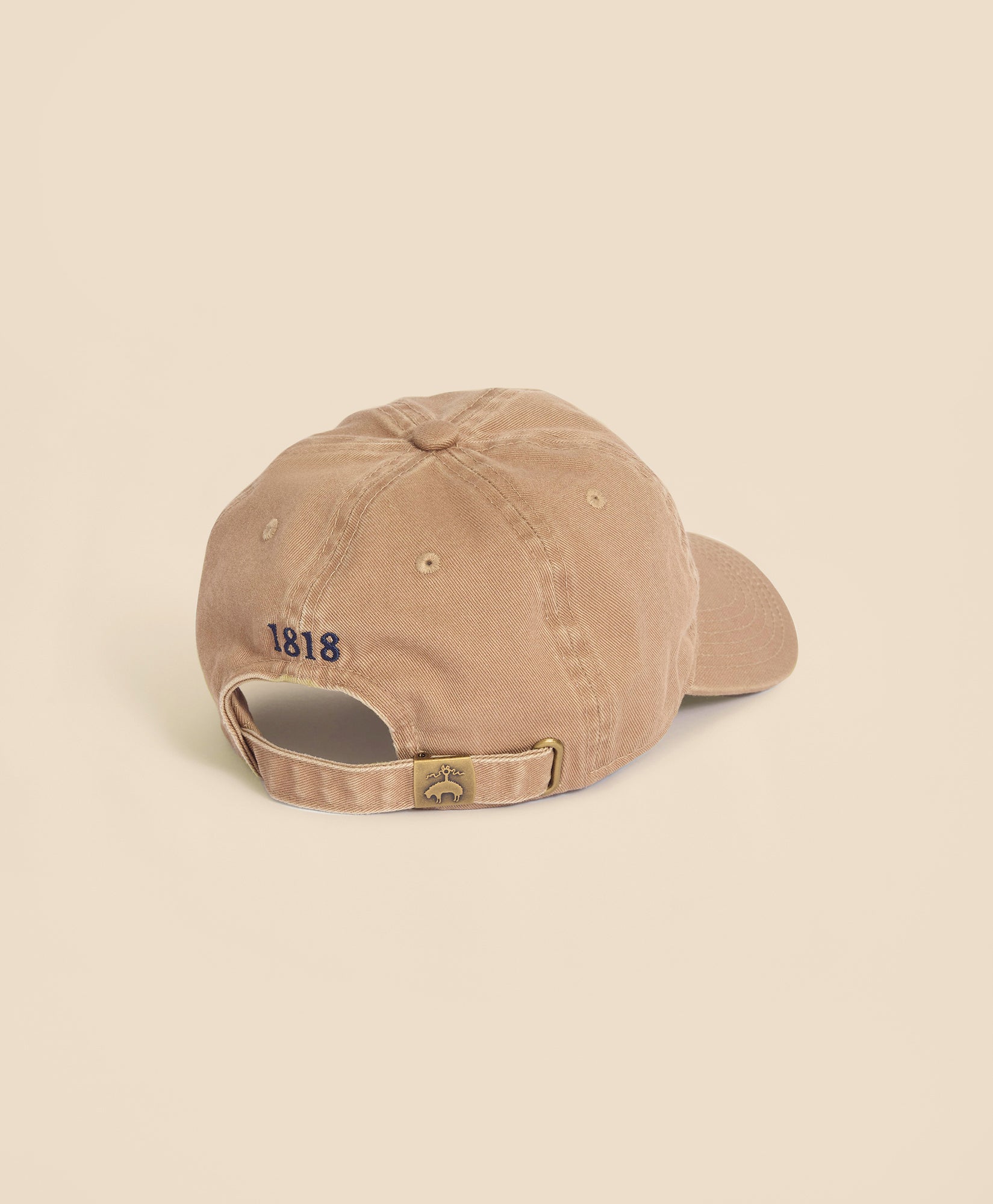 Beige cap with '1818' logo