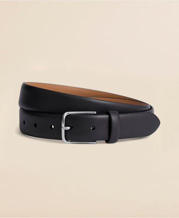 Black leather belt with a silver buckle