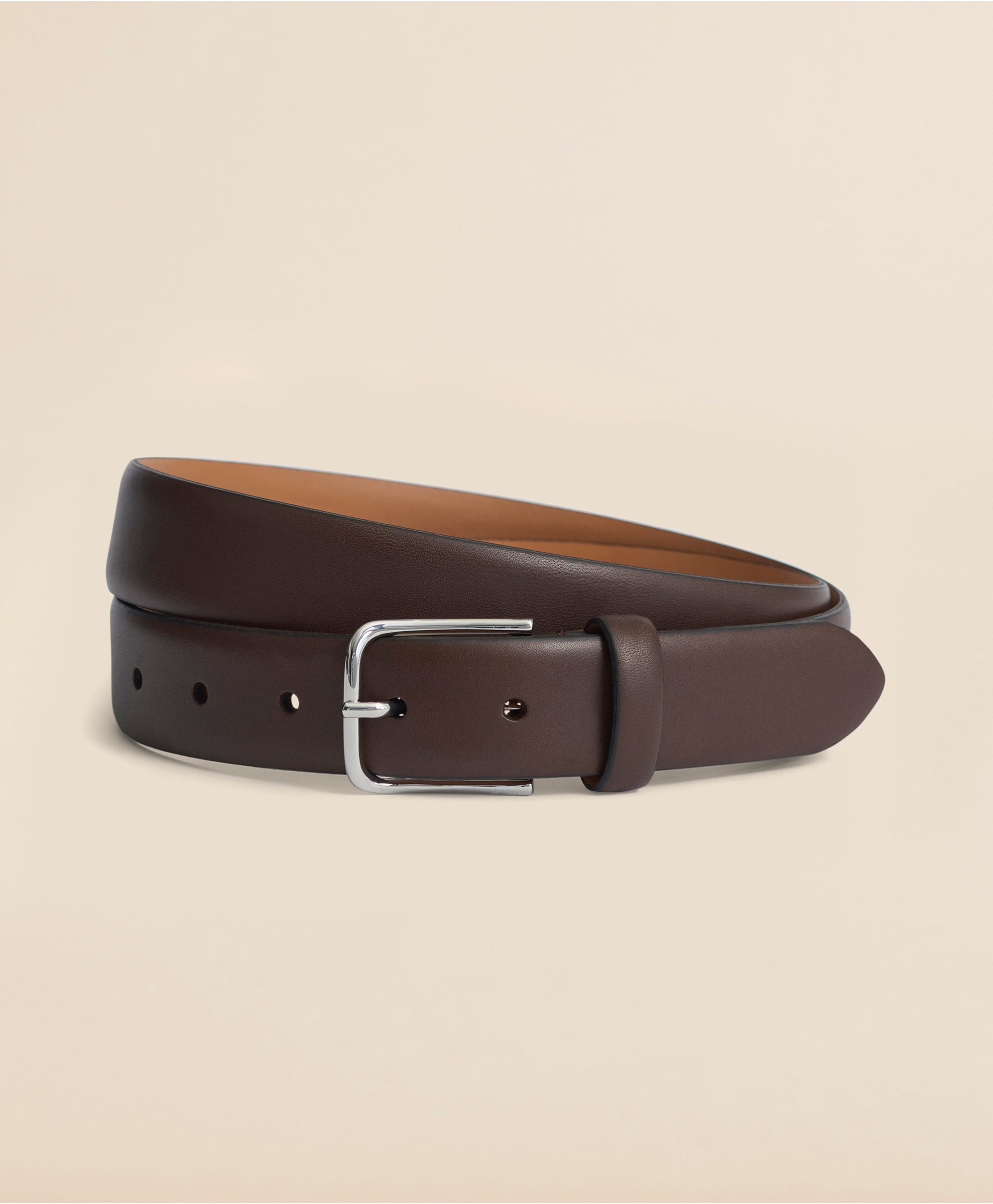 Brown leather belt with a silver buckle