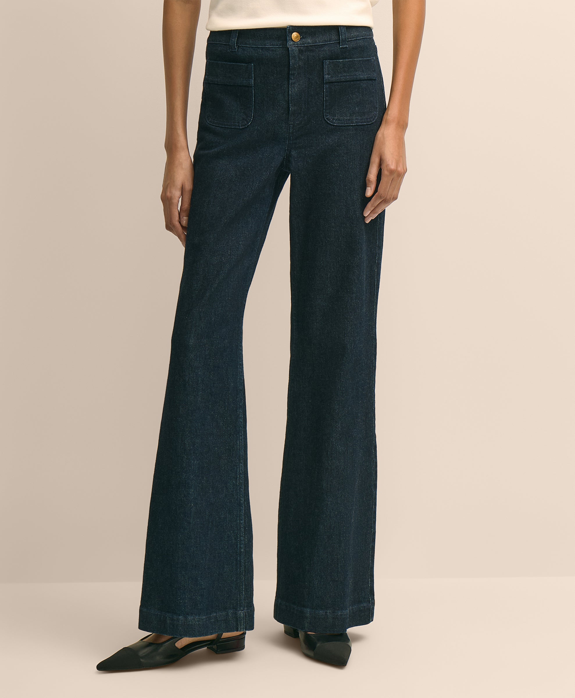 Dark blue jeans worn by a person