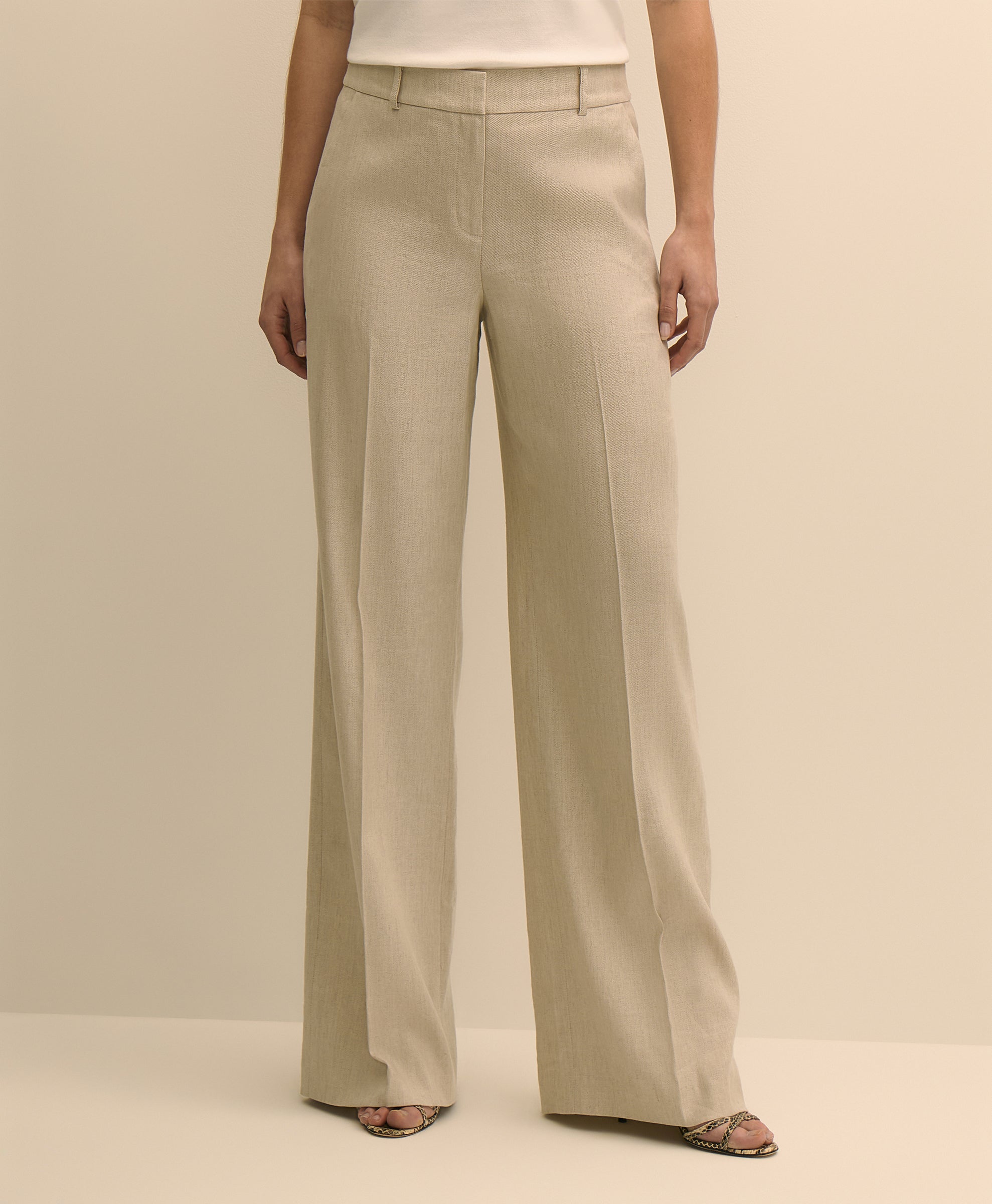 Beige wide-leg pants worn by a person