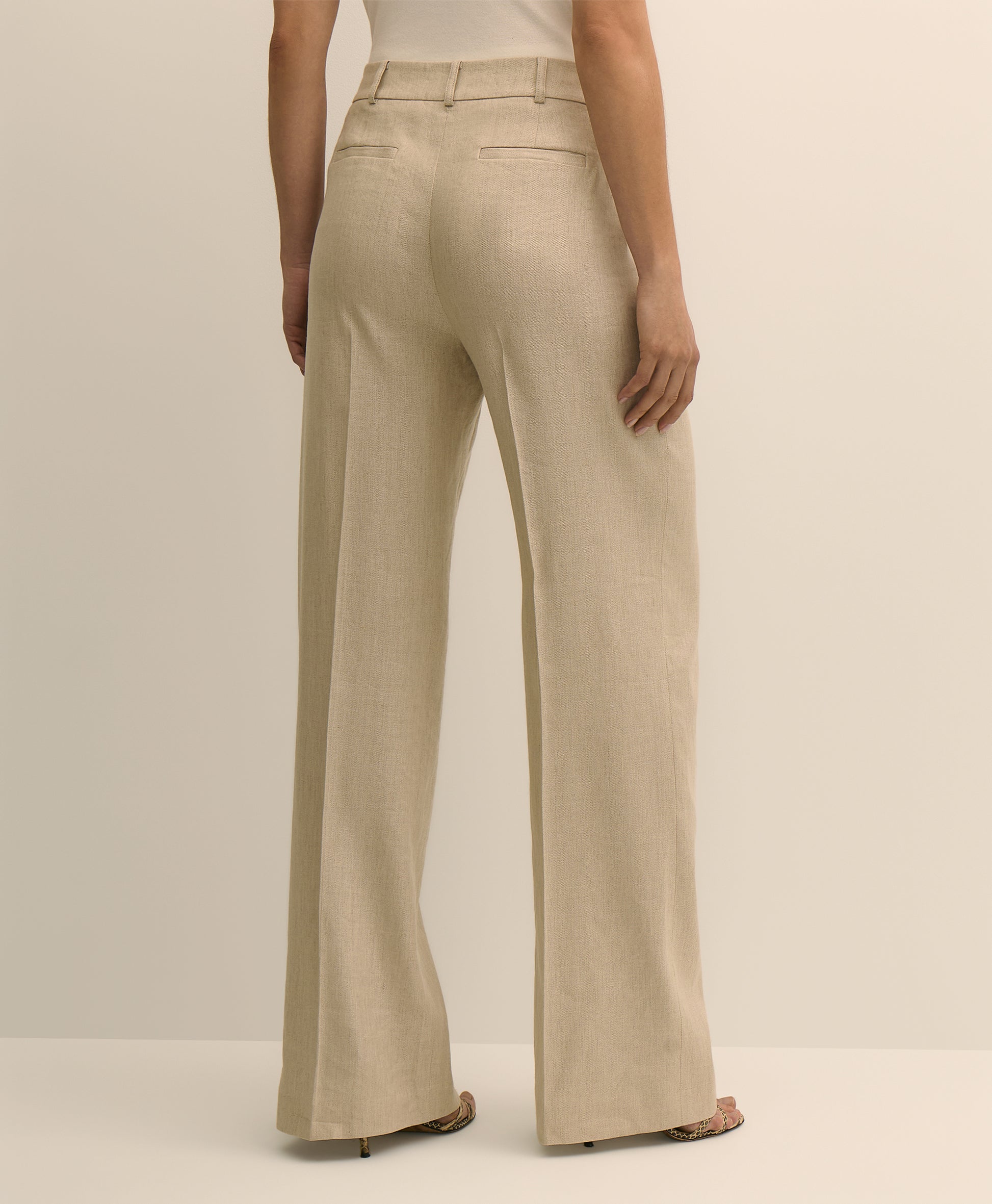 Beige wide-leg pants worn by a person