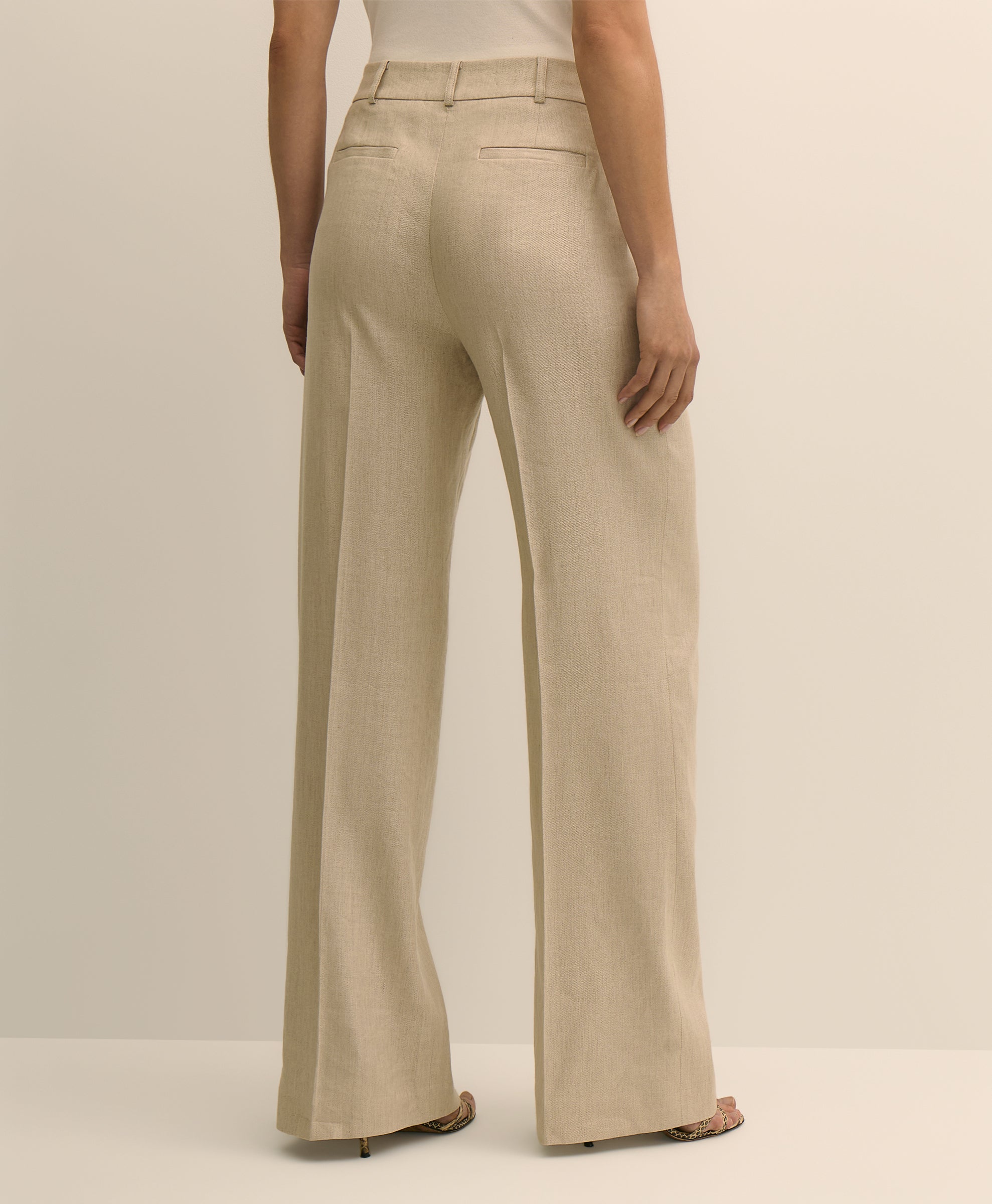 Beige wide-leg pants worn by a person